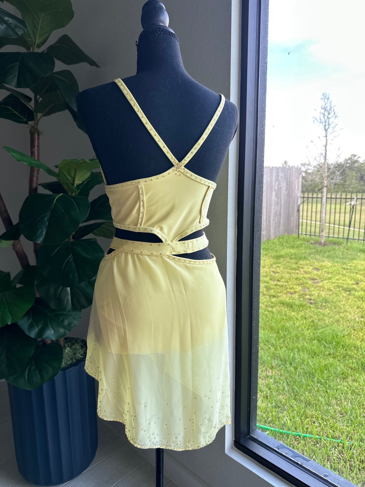 Butter yellow lyrical costume, back view with cross straps
